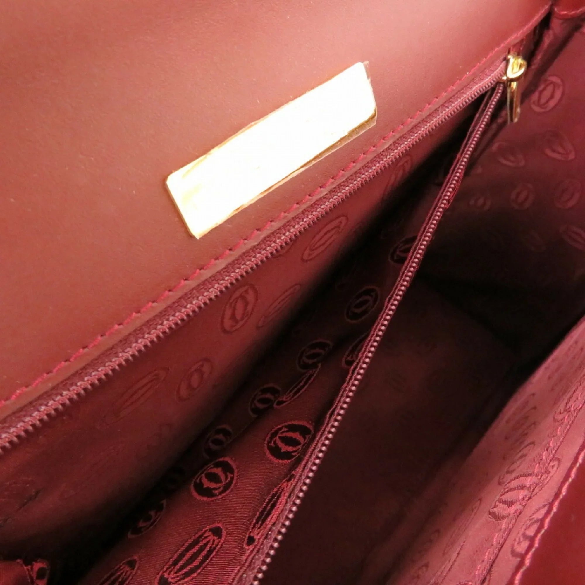 Pre-Owned must bordeaux line (Good) red Cartier leather handbag